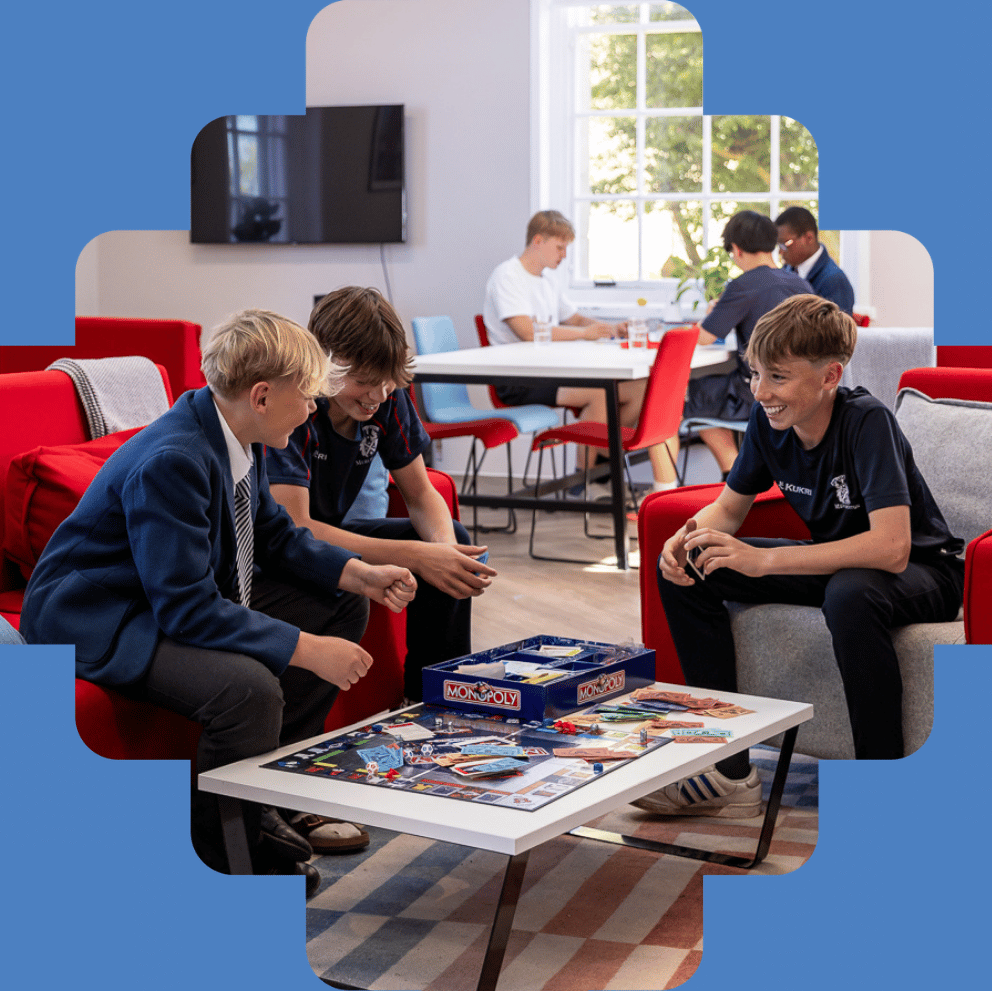 Boys hanging out in boarding house